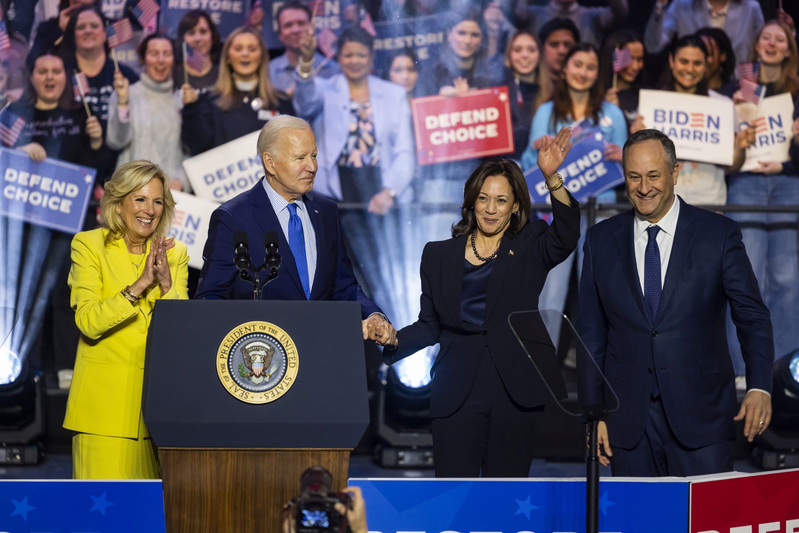 epa11099801 US President Joe Biden (C-L), along with First Lady Jill Biden (L), Vice President Kamala Harris (C-R), and First Gentleman Douglas Emhoff (R), celebrate at a campaign rally for abortion rights at George Mason University in Manassas, Virginia, USA, 23 January 2024. The rally comes one day after the 51st anniversary of the Supreme Court's Roe v. Wade decision, which the high justices overturned in 2022.  EPA/JIM LO SCALZO
