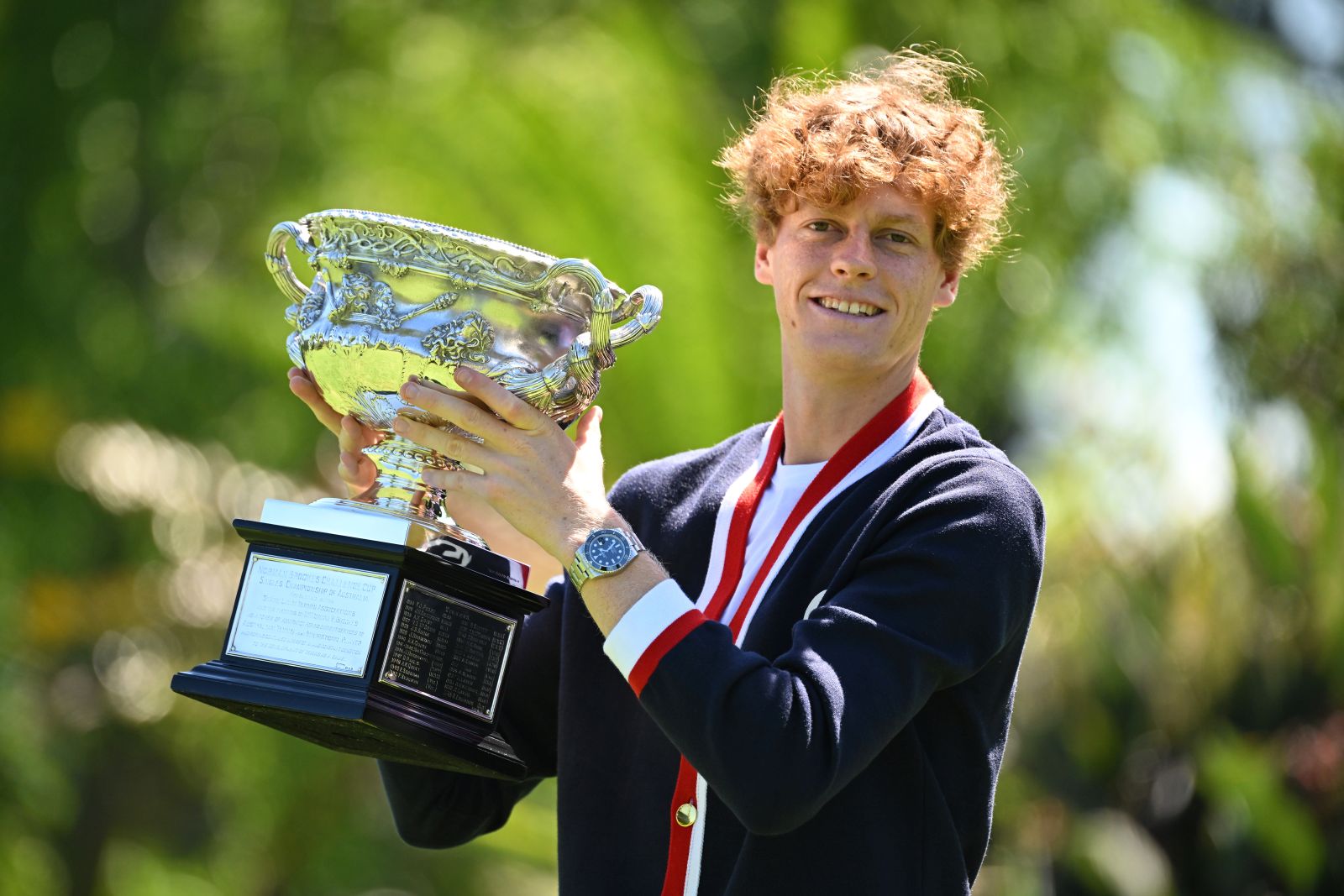 epa11111780 Jannik Sinner of Italy poses for a photograph with the Norman Brookes Challenge Cup following his win over Daniil Medvedev of Russia in the Men’s Singles Final at the 2024 Australian Open tennis tournament in Melbourne, Australia, 29 January 2024.  EPA/JAMES ROSS AUSTRALIA AND NEW ZEALAND OUT
