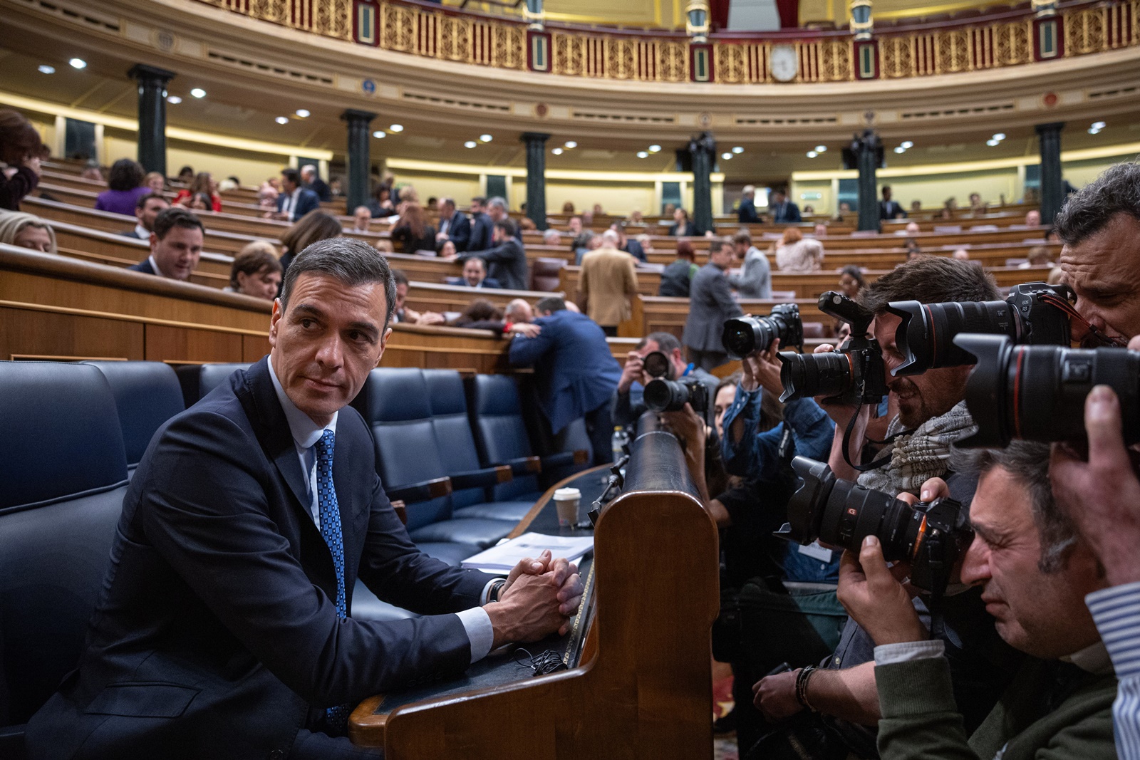 epa11114336 Spanish Prime Minister Pedro Sanchez (L) attends a plenary session at the Spanish Lower House to vote on the so-called Amnesty Law, in Madrid, Spain, 30 January 2024. The amnesty law is part of a deal struck by the Spanish prime minister's Spanish Socialist Workers' Party (PSOE) to form a new minority coalition government with the support of Catalan and Basque pro-independent parties following an inconclusive election in July 2023. The bill would grant amnesty to people facing legal issues for involvement in Catalonia's failed 2017 independence bid.  EPA/DANIEL GONZALEZ