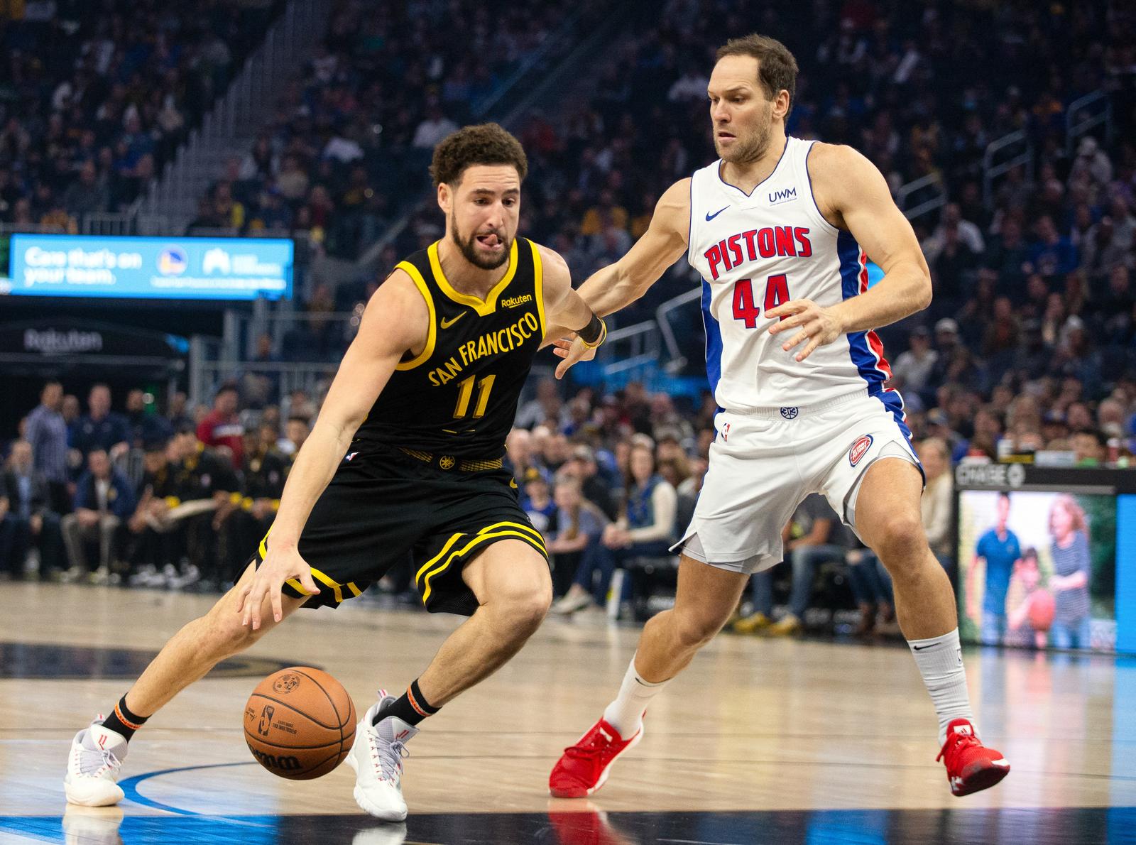 Jan 5, 2024; San Francisco, California, USA; Golden State Warriors guard Klay Thompson (11) drives past Detroit Pistons forward Bojan Bogdanovic (44) during the first quarter at Chase Center. Mandatory Credit: D. Ross Cameron-USA TODAY Sports Photo: D. Ross Cameron/REUTERS