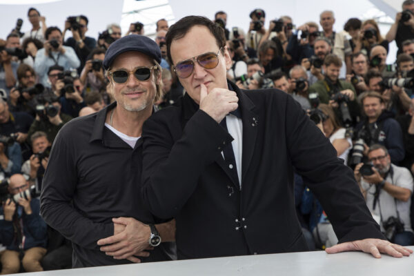 Brad Pitt and Quentin Tarantino pose for photographers at the photo call for the film 'Once Upon a Time in Hollywood' at the 72nd international film festival, Cannes, southern France, Wednesday, May 22, 2019. (Photo by Vianney Le Caer/Invision/AP)
