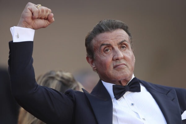 Actor Sylvester Stallone poses for photographers upon arrival at the awards ceremony of the 72nd international film festival, Cannes, southern France, Saturday, May 25, 2019. (AP Photo/Petros Giannakouris)