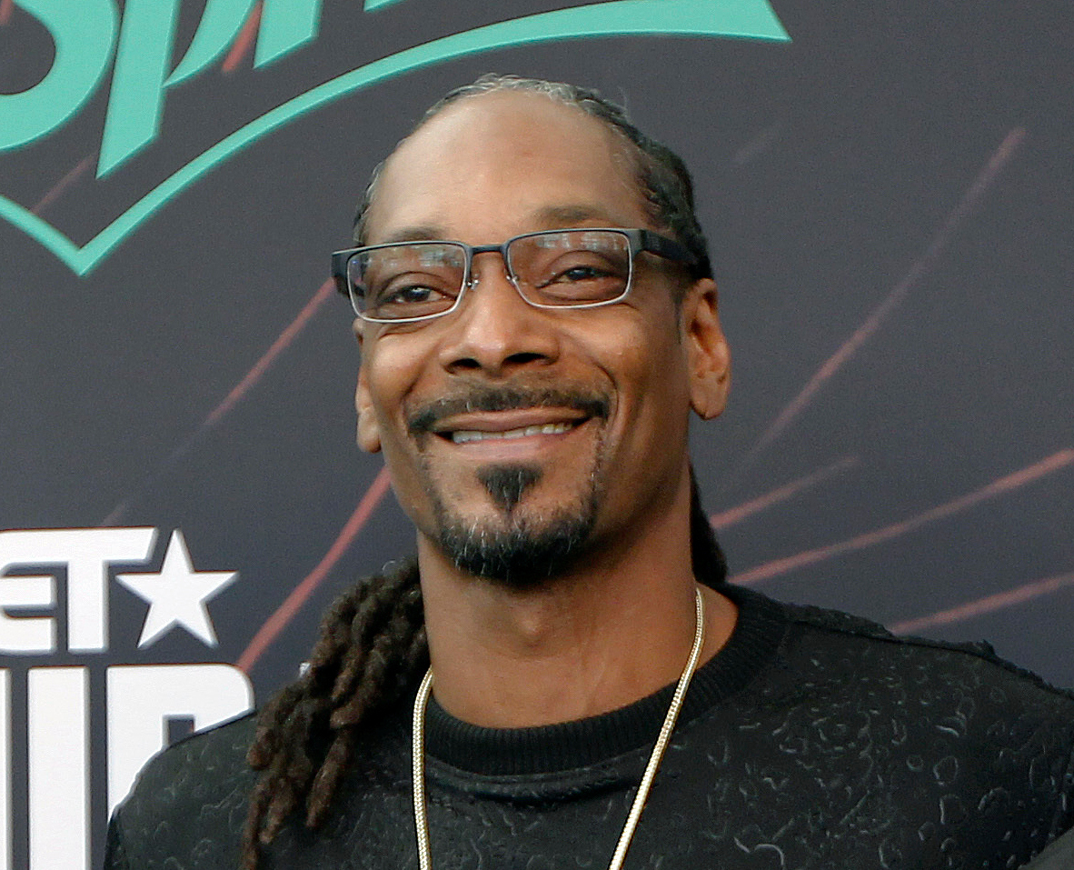 FILE - In this Sept. 17, 2016 file photo, Snoop Dog smiles at the BET Hip Hop Awards in Atlanta. An Israeli start-up that promotes home-grown marijuana says it has signed on American rapper Snoop Dogg as a brand ambassador. Snoop, an outspoken advocate of marijuana use, will promote Seedo’s small refrigerator-like machine that grows cannabis and other plants with the help of artificial intelligence. Snoop started his own line of marijuana products, Leafs by Snoop, in 2015. (AP Photo/Tami Chappell, File)