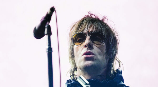 British singer Liam Gallagher performs on stage in London, Tuesday, Aug. 17, 2021, during a free concert attended by staff members of the British National Health Service. (AP Photo/Alberto Pezzali)