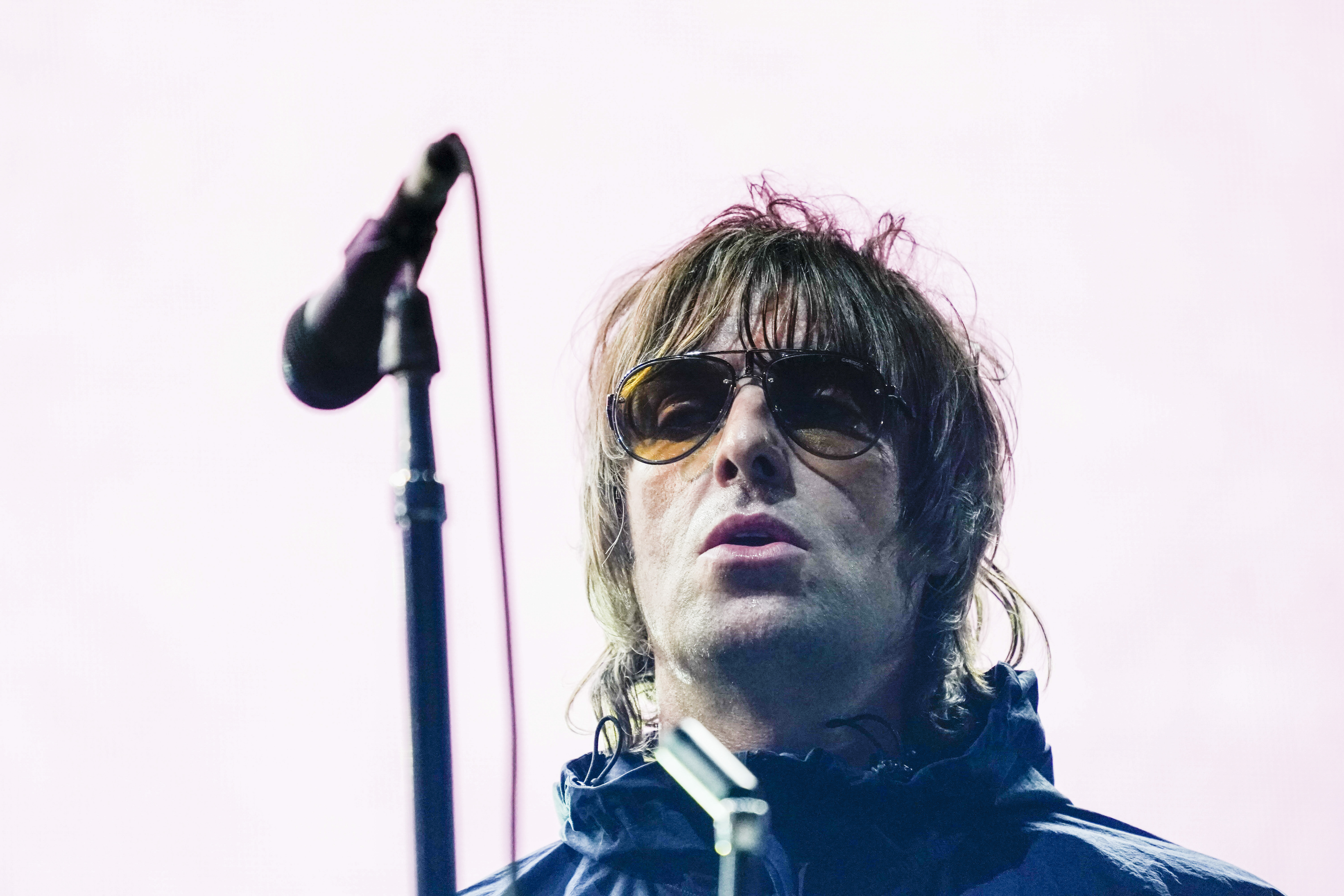 British singer Liam Gallagher performs on stage in London, Tuesday, Aug. 17, 2021, during a free concert attended by staff members of the British National Health Service. (AP Photo/Alberto Pezzali)