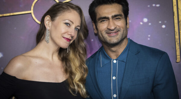 Emily V. Gordon, left, and Kumail Nanjiani pose for photographers upon arrival at the premiere of the film 'Eternals' on Wednesday, Oct. 27, 2021 in London. (Photo by Vianney Le Caer/Invision/AP)