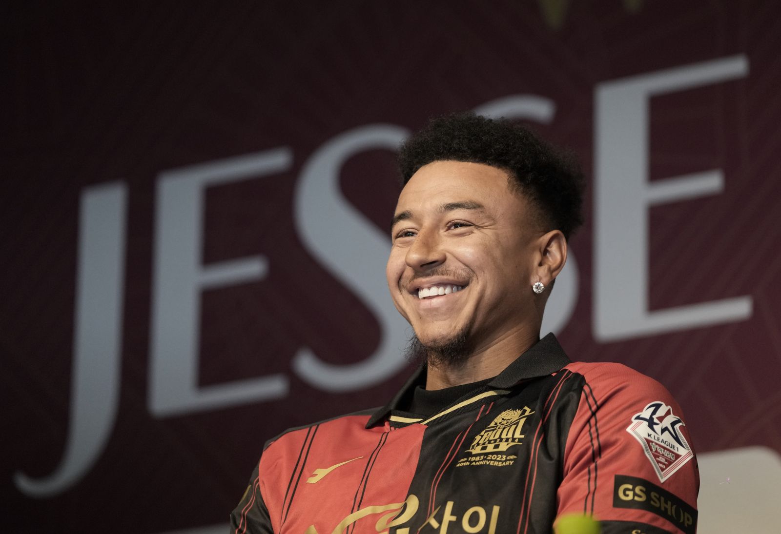 Former Manchester United midfielder Jesse Lingard smiles during a press conference as Lingard joins FC Seoul, the K League 1 club, at Seoul Word Cup Stadium in Seoul, South Korea, Thursday, Feb. 8, 2024. (AP Photo/Ahn Young-joon)
