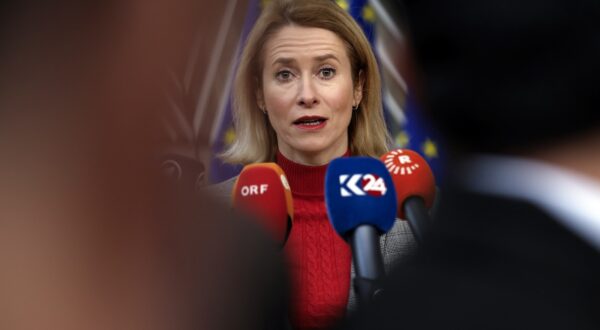 FILE -  Estonia's Prime Minister Kaja Kallas talks to journalists as he arrives for an EU summit in Brussels, on Feb. 1, 2024. Russia has put Estonian Prime Minister Kaja Kallas on a wanted list, an official register showed Tuesday, Feb. 13, 2024, a move that comes amid soaring Russia-West tensions over Ukraine. (AP Photo/Omar Havana)