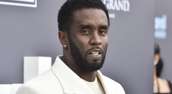 FILE - Music mogul and entrepreneur Sean "Diddy" Combs arrives at the Billboard Music Awards, May 15, 2022, in Las Vegas. Combs was sued Monday, Feb. 26, 2024, by a music producer who accused the hip-hop mogul of sexually assaulting him and forcing him to have sex with prostitutes. (Photo by Jordan Strauss/Invision/AP, File)