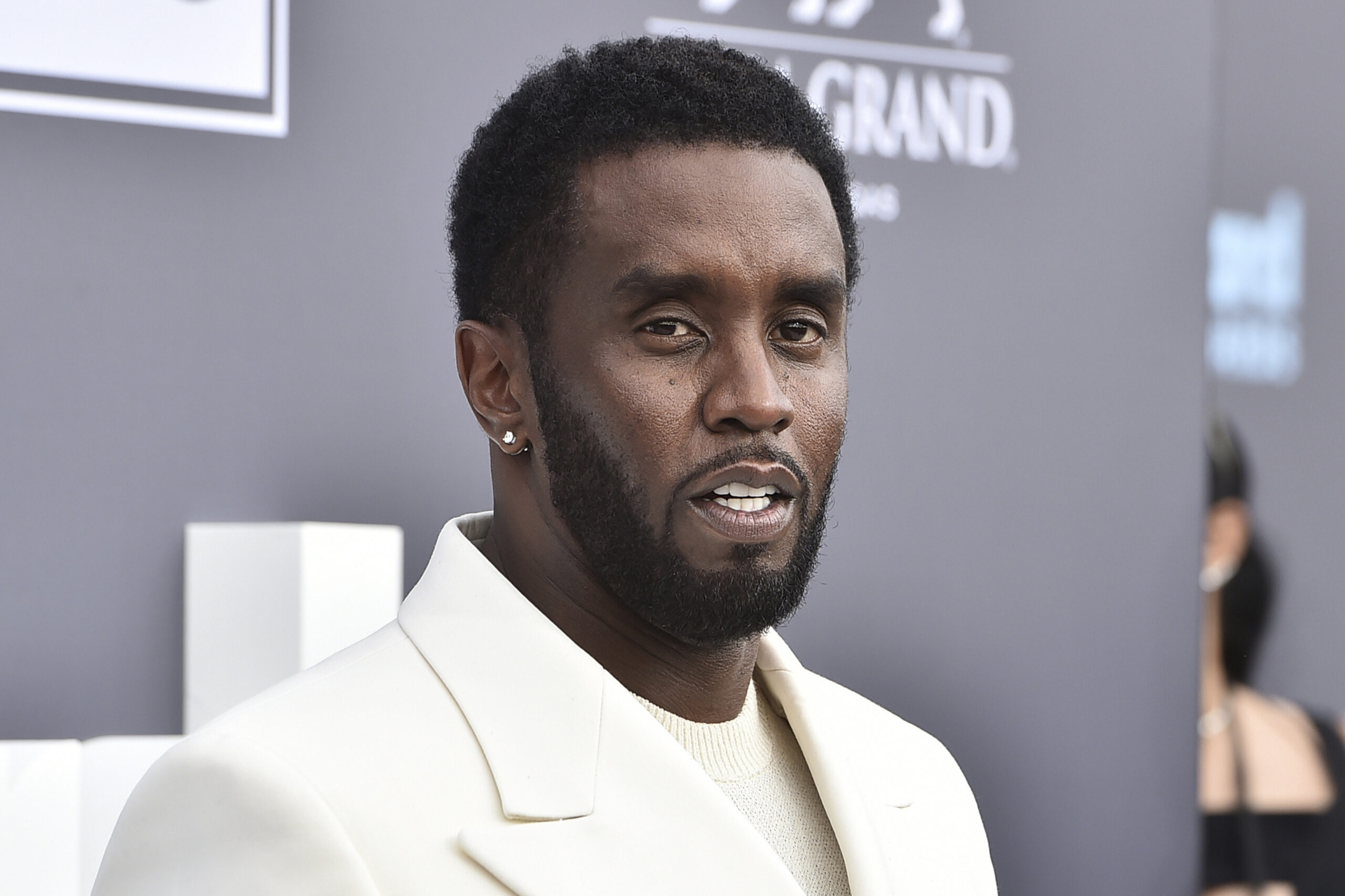 FILE - Music mogul and entrepreneur Sean "Diddy" Combs arrives at the Billboard Music Awards, May 15, 2022, in Las Vegas. Combs was sued Monday, Feb. 26, 2024, by a music producer who accused the hip-hop mogul of sexually assaulting him and forcing him to have sex with prostitutes. (Photo by Jordan Strauss/Invision/AP, File)
