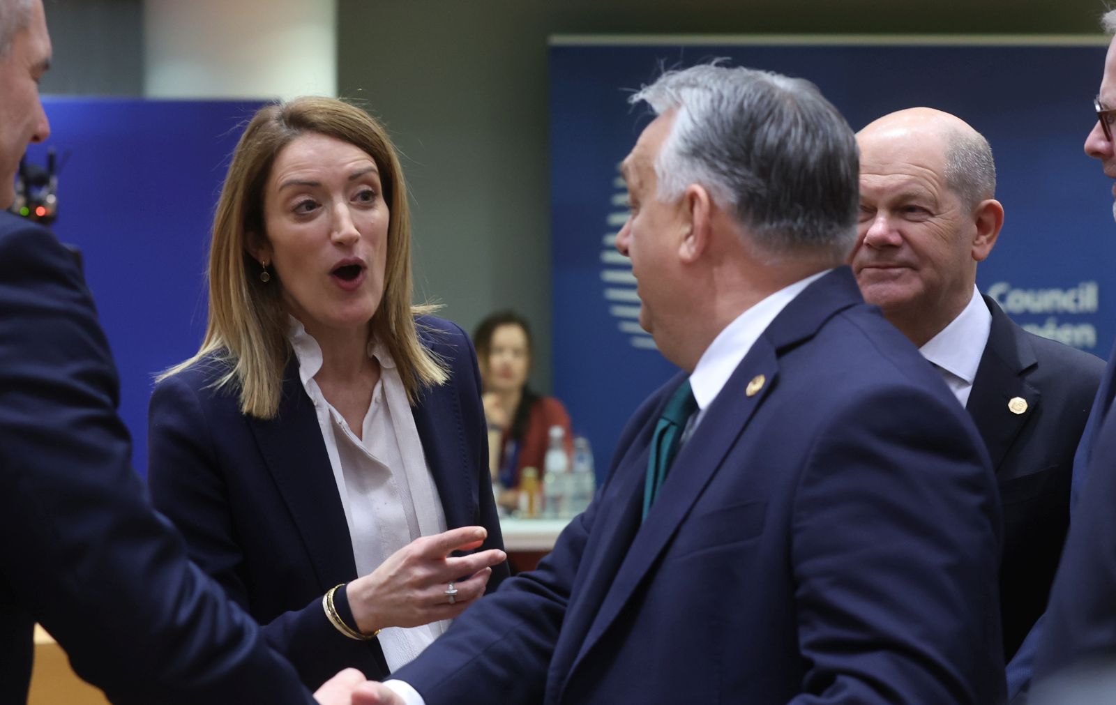 epa11117662 (L-R) European Parliament President Roberta Metsola, Hungarian Prime Minister Viktor Orban and German Chancellor Olaf Scholz at the start of a Special European Council in Brussels, Belgium, 01 February 2024. EU leaders gather in Brussels to discuss the mid-term revision of the EU's long-term budget for 2021-2027, including support to Ukraine.  EPA/OLIVIER HOSLET