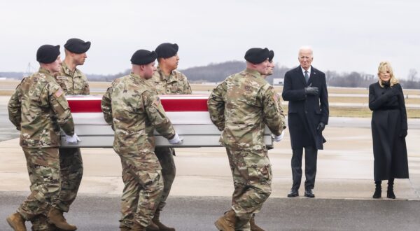 epa11121592 US President Joe Biden (2-R)  and First Lady Dr. Jill Biden (R) watch as a US Army carry team moves a flag-draped transfer case containing the remains of US Army Sergeant Breonna Moffett, during a dignified transfer of fallen US service members at Dover Air Force Base in Dover, Delaware, USA, 02 February 2024. US Army Sergeant Jerome Rivers. US Army Sergeant Breonna Moffett, and US Army Sergeant Kennedy Sanders died in a drone strike on 28 January at a military base in Jordan; forty other US troops were also injured in the attack. The enemy drone, which the White House has blamed on an Iran-backed militia, may have been mistaken for a US drone and left unimpeded, according to a preliminary report.  EPA/MICHAEL REYNOLDS