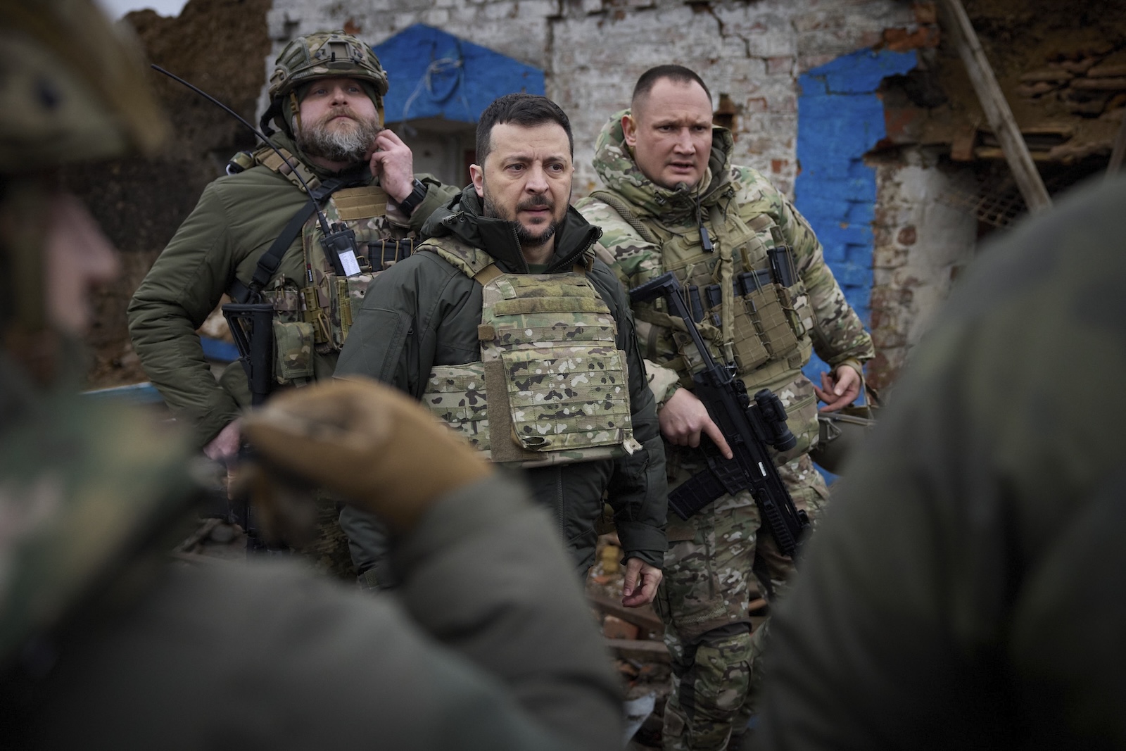 epa11126083 A handout photo made available by the Ukrainian Presidential Press Service shows Ukraine's President Volodymyr Zelensky (C) during a visit to frontline positions near Robotyne village, Zaporizhzhia region, southeastern Ukraine, 04 February 2024, amid the Russian invasion. According to the presidential office, Zelensky, during a working trip to the Zaporizhzhia region, visited Ukrainian soldiers near the frontline village of Robotyne and handed them state awards. Russian troops entered Ukrainian territory on 24 February 2022, starting a conflict that has provoked destruction and a humanitarian crisis.  EPA/UKRAINIAN PRESIDENTIAL PRESS SERVICE HANDOUT -- MANDATORY CREDIT: UKRAINIAN PRESIDENTIAL PRESS SERVICE --  HANDOUT EDITORIAL USE ONLY/NO SALES HANDOUT EDITORIAL USE ONLY/NO SALES