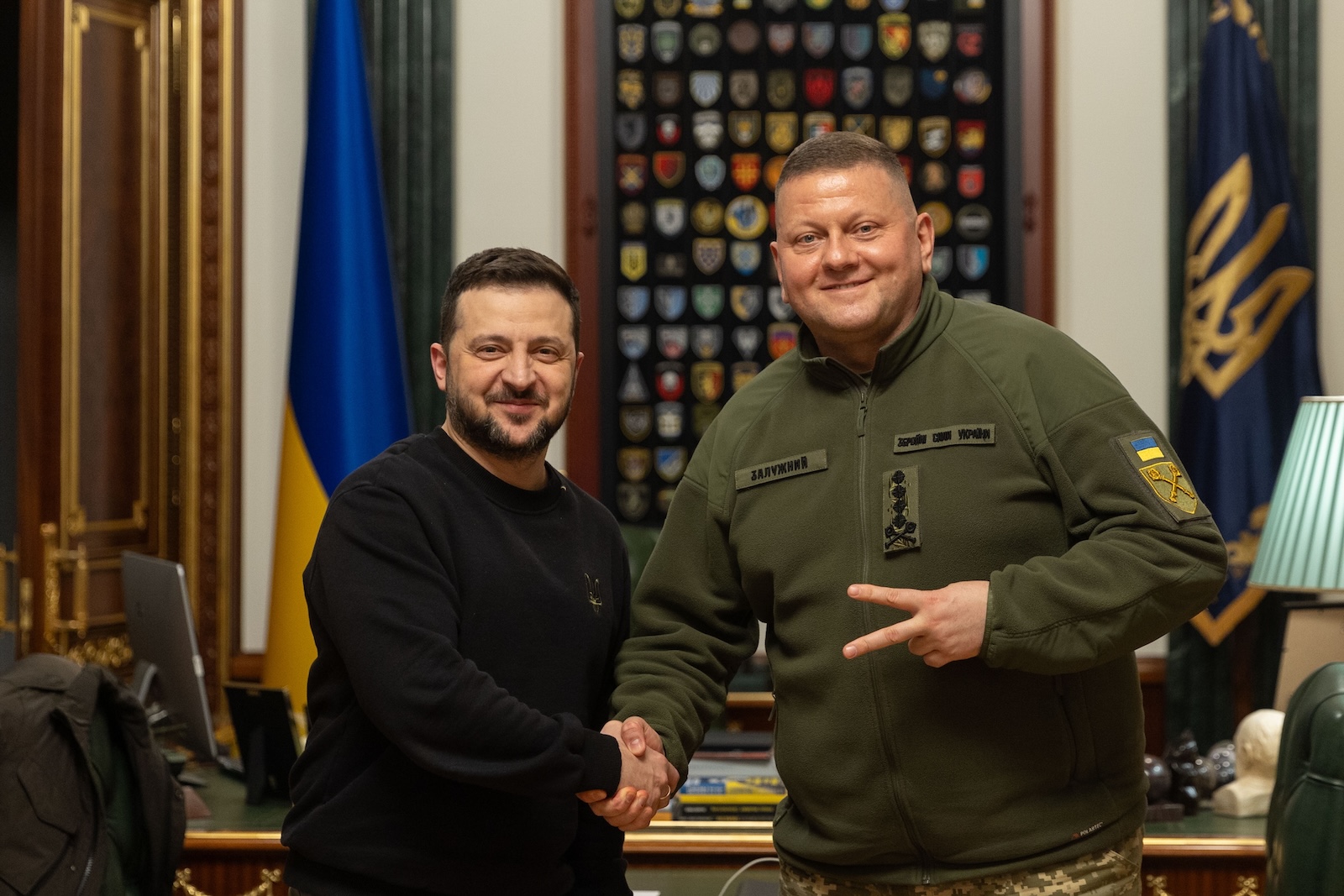 epa11137427 A handout photo made available by the Ukrainian Presidential Press Service on 08 February 2024 shows Ukraine's President Volodymyr Zelensky (L) shaking hands with Commander-in-Chief of the Armed Forces of Ukraine Valerii Zaluzhnyi during a meeting in Kyiv, Ukraine. On 08 February 2024, Ukraine's President Zelensky removed Commander-in-Chief of the Armed Forces of Ukraine Valerii Zaluzhnyi from his post. 'Today, I made the decision to renew the leadership of the Armed Forces of Ukraine', Zelensky said, adding 'I am grateful to General Zaluzhnyi for two years of defense'. Oleksandr Syrskyi, commander of the Ukrainian Ground Forces, has been appointed as new Commander-in-Chief of the country's Armed Forces.  EPA/UKRAINIAN PRESIDENTIAL PRESS SERVICE HANDOUT -- MANDATORY CREDIT: UKRAINIAN PRESIDENTIAL PRESS SERVICE --  HANDOUT EDITORIAL USE ONLY/NO SALES HANDOUT EDITORIAL USE ONLY/NO SALES