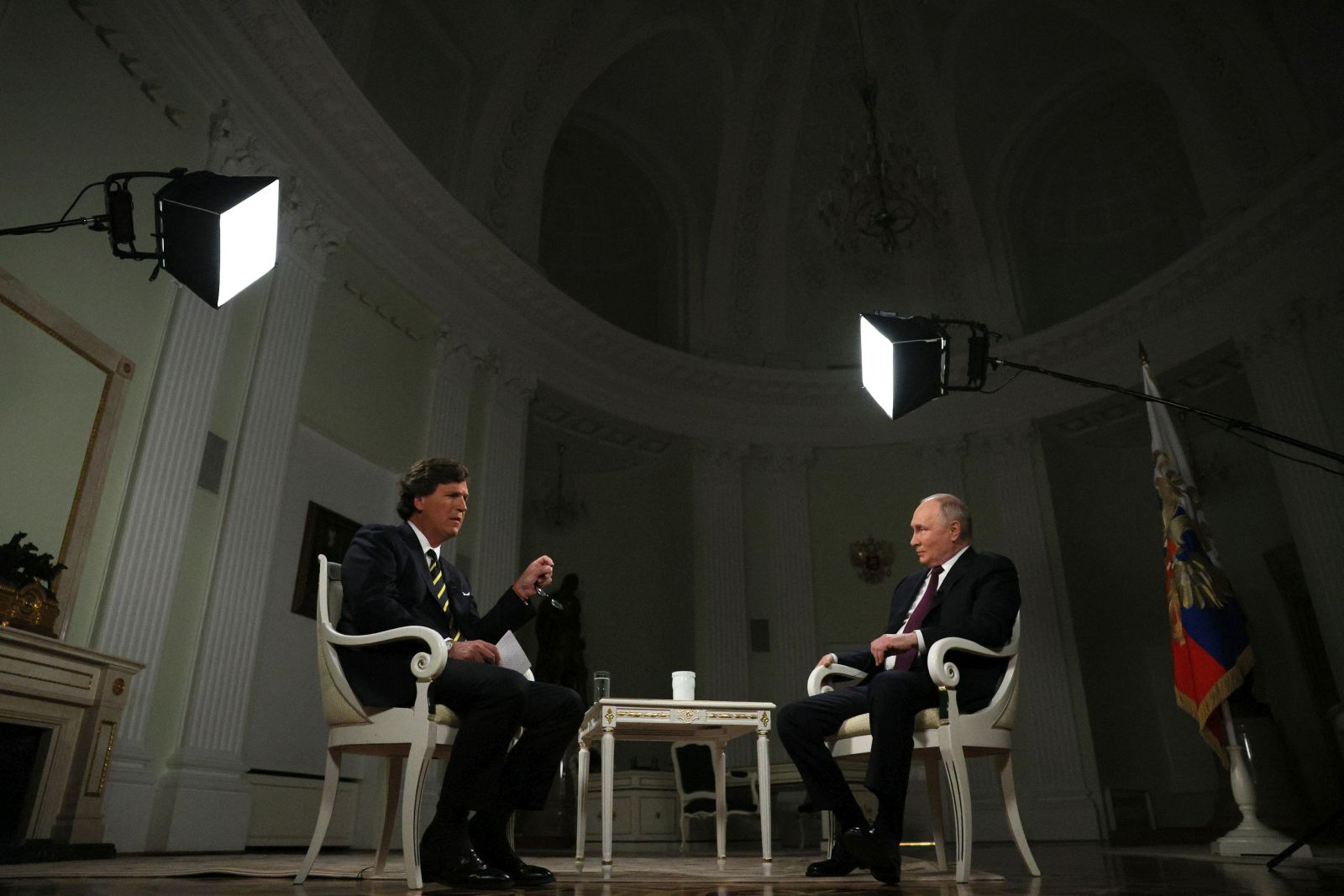 epa11138505 Russian President Vladimir Putin (R) attends an interview with US journalist Tucker Carlson at the Kremlin in Moscow, Russia, 09 February 2024.  EPA/GAVRIIL GRIGOROV/SPUTNIK/KREMLIN POOL MANDATORY CREDIT