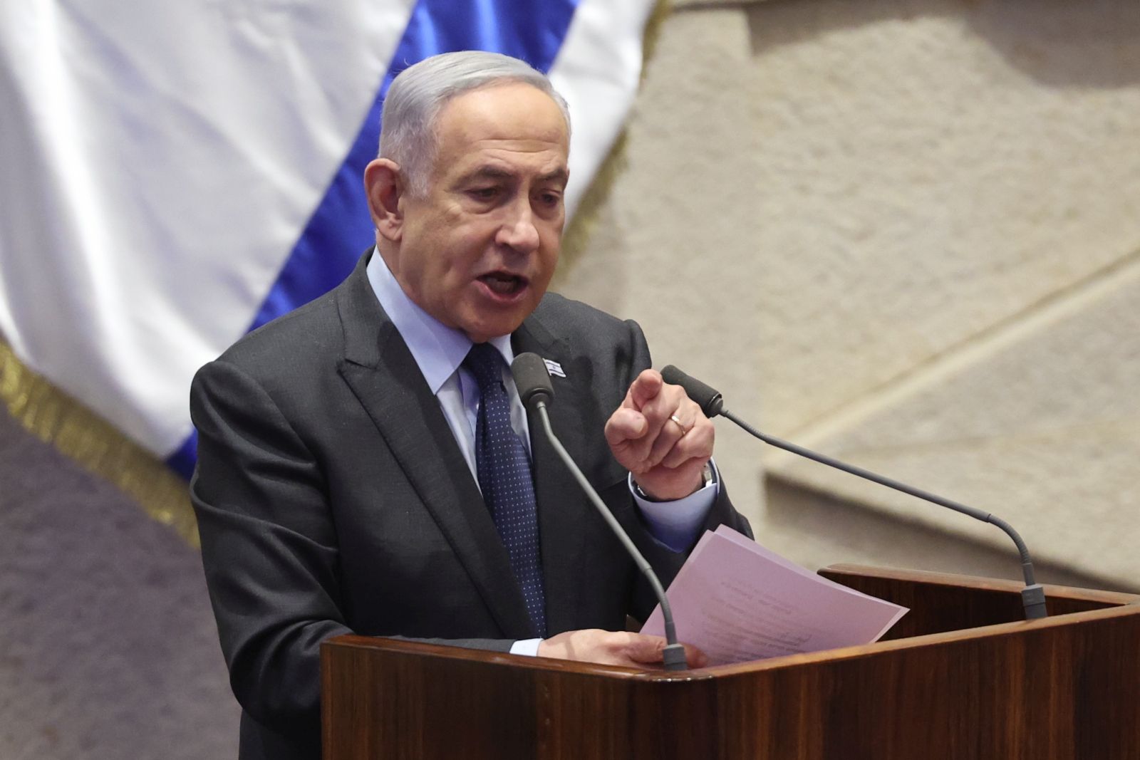 epaselect epa11166727 Israeli Prime Minister Benjamin Netanyahu speaks during the voting session for the impeachment of Hadash-Ta’al party MP Ofer Cassif in Jerusalem, 19 February 2024. The motion was brought up after Cassif publicly supported South Africa’s genocide case against Israel at the International Court of Justice (ICJ).  EPA/ABIR SULTAN
