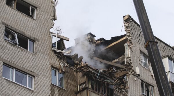 epa11174262 Rescuers work on the site of an overnight shock drone attack on a residential building in Dnipro, Dnipropetrovsk region, southeastern Ukraine, 23 February 2024, amid the Russian invasion. At least eight people were injured in Dnipro as Russia launched 31 shock drones on the south and central, 23 of them intercepted, according to the Ukrainian Air Force.  EPA/ARSEN DZODZAIEV