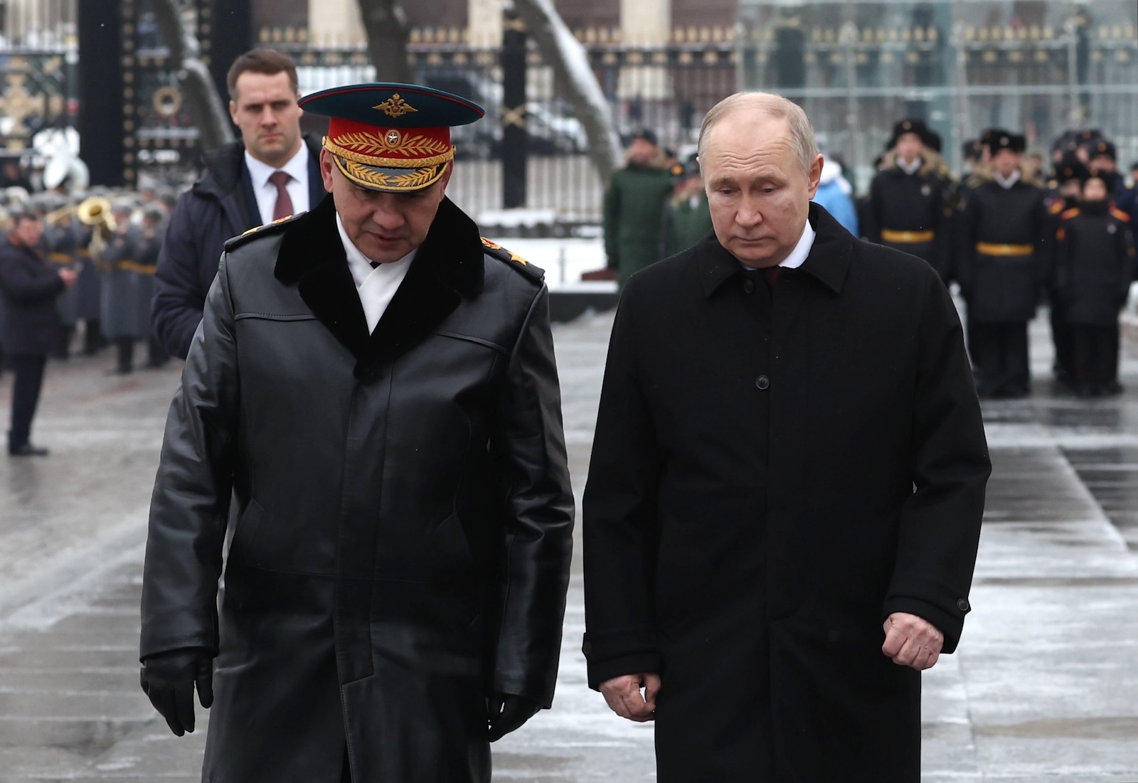 epa11175231 Russian President Vladimir Putin (R) and Defence Minister Sergei Shoigu (L) take part in a wreath laying ceremony at the Tomb of the Unknown Soldier in Alexander Garden on Defender of the Fatherland Day, in Moscow, Russia 23 February 2024. The 23 February is celebrated as the Defender of the Fatherland Day in Russia, Belarus, Kyrgyzstan, and Tajikistan marking the date in 1918 when the first mass draft into the Red Army took place in Moscow and Petrograd during the country's Civil War and war against the German Emperor.  EPA/ALEXANDER KAZAKOV/SPUTNIK/KREMLIN POOL MANDATORY CREDIT