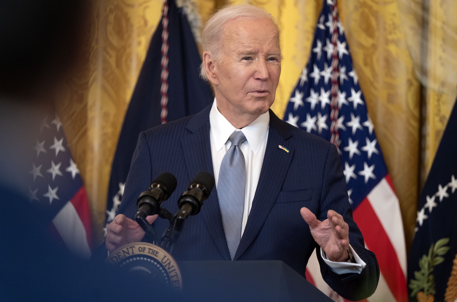 epa11175589 US President Joe Biden delivers remarks during the National Governors Association Winter Meeting in the East Room of the White House in Washington, DC, USA, 23 February 2024. The Biden administration announced on February 21 that some 150,000 borrowers will receive a cumulative 1.2 billion US dollar in student-debt forgiveness under the income-driven repayment program known as SAVE.  EPA/LEIGH VOGEL / POOL