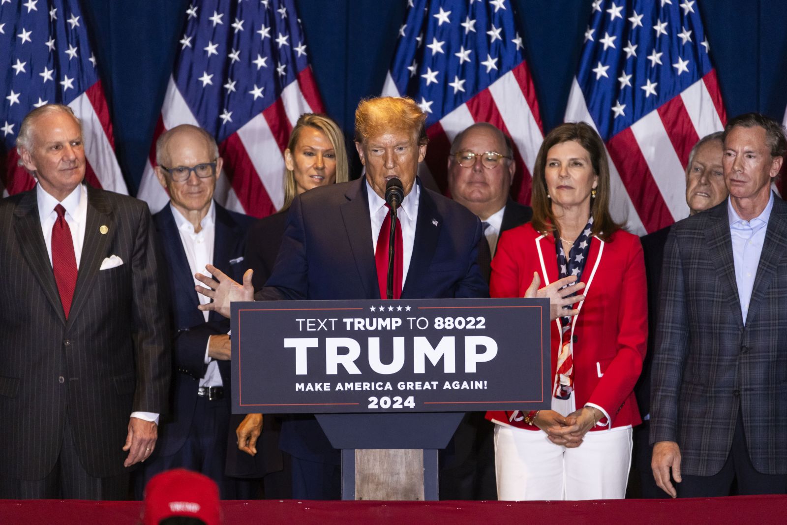 epa11179437 Former US President Donald Trump (C) speaks after defeating former governor Nikki Haley in South Carolina's Republican presidential primary in Columbia, South Carolina, USA, 24 February 2024. Though Trump defeated Haley handily, she is vowing to stay in the primary race.  EPA/JIM LO SCALZO