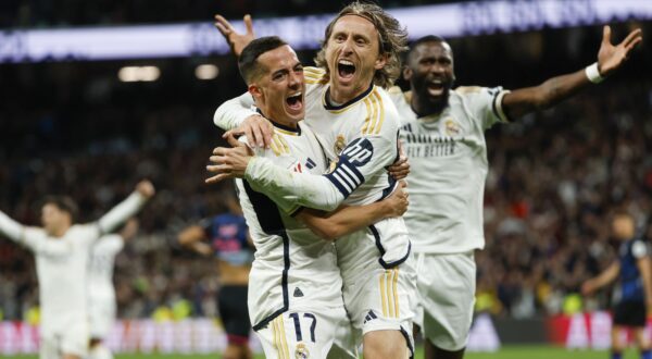 epa11181548 Real Madrid's Luka Modric (C) celebrates after scoring the 1-0 goal during the Spanish LaLiga soccer match between Real Madrid and Sevilla FC in Madrid, Spain, 25 February 2024.  EPA/Javier Lizon