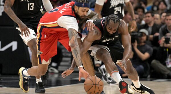 Feb 7, 2024; Los Angeles, California, USA;   Los Angeles Clippers guard James Harden (1) beats New Orleans Pelicans forward Brandon Ingram (14) to a loose ball in the second half at Crypto.com Arena. Mandatory Credit: Jayne Kamin-Oncea-USA TODAY Sports Photo: Jayne Kamin-Oncea/REUTERS