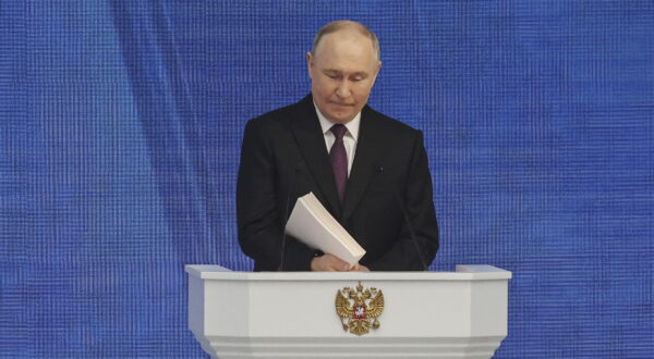 epa11187976 Russian President Vladimir Putin delivers his annual address to the Federal Assembly at the Gostiny Dvor conference center in Moscow, Russia, 29 February 2024. About 1,200 people, including lawmakers of Russia’s two-chamber parliament, Government members, heads of the Constitutional and Supreme court, and regional governors, were invited to attend the event.  EPA/SERGEI ILNITSKY
