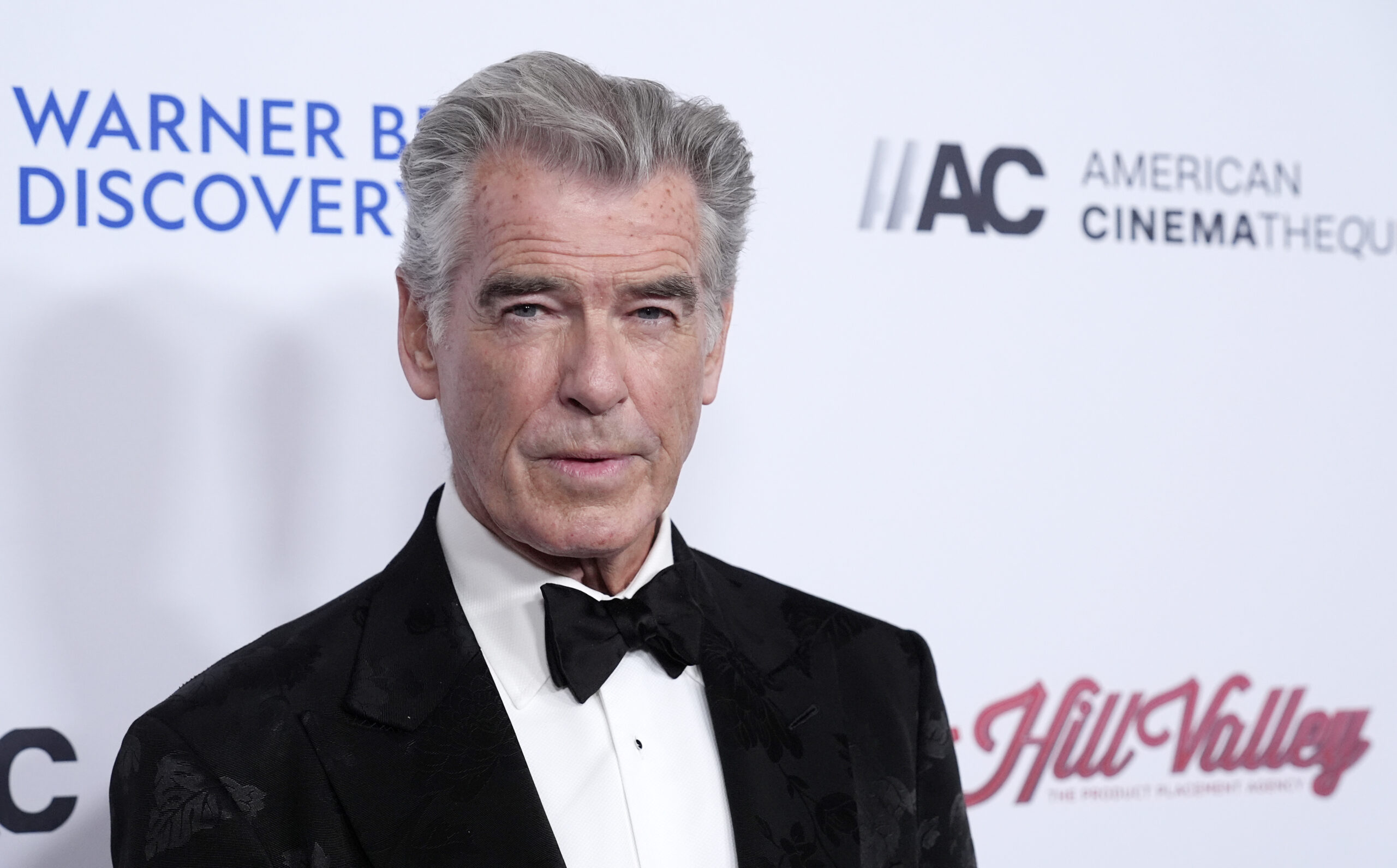 Pierce Brosnan poses at the 37th Annual American Cinematheque Awards at the Beverly Hilton, Thursday, Feb. 15, 2024, in Beverly Hills, Calif. (AP Photo/Chris Pizzello)