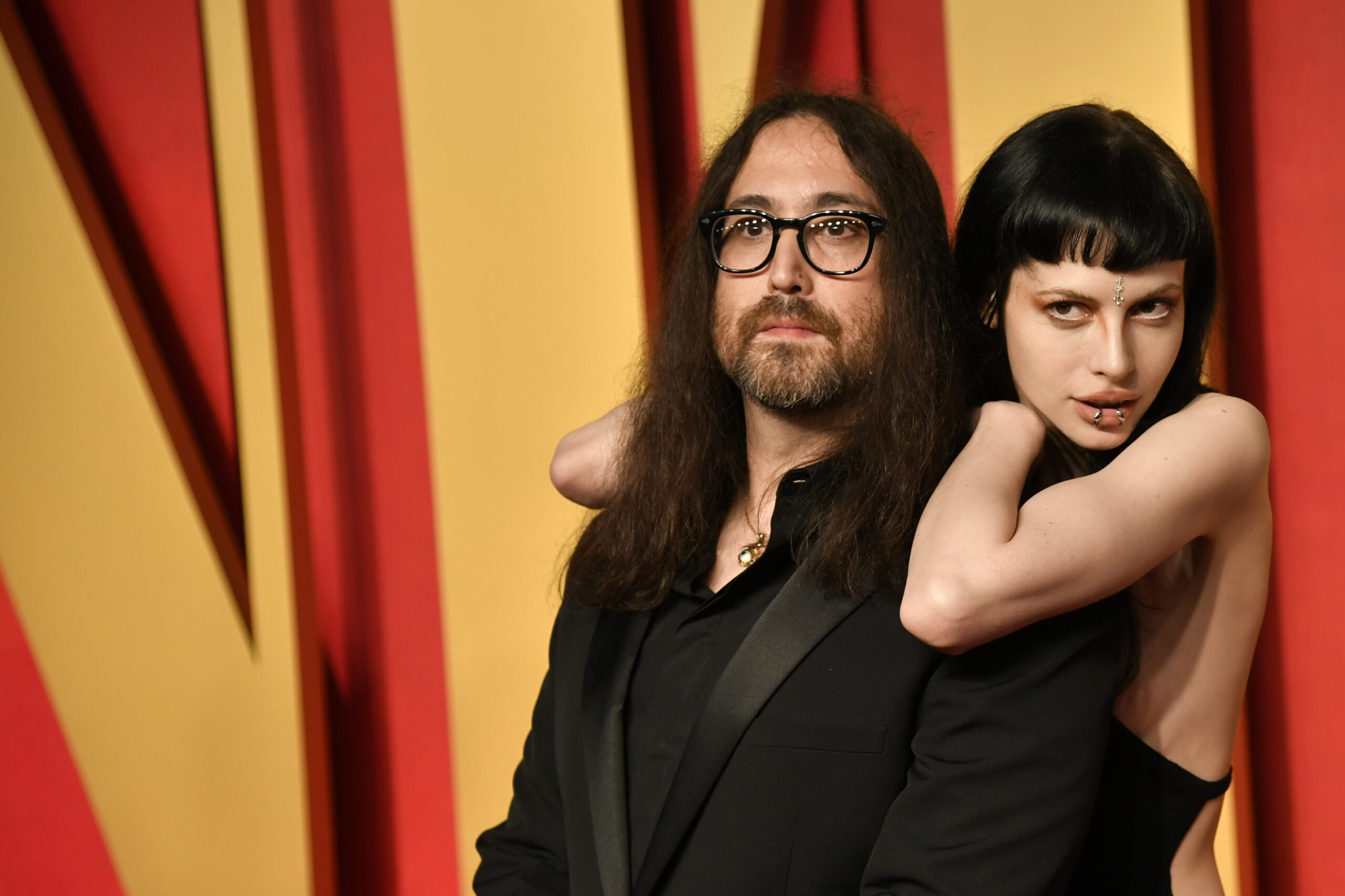 Sean Lennon, left, and Kemp Muhl arrive at the Vanity Fair Oscar Party on Sunday, March 10, 2024, at the Wallis Annenberg Center for the Performing Arts in Beverly Hills, Calif. (Photo by Evan Agostini/Invision/AP)