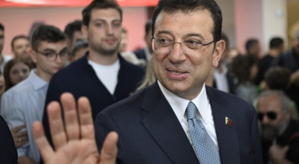 Incumbent Istanbul's mayor and mayoral candidate Ekrem Imamoglu (C) arrives at the polling station to vote for the municipal elections, in Istanbul on March 31, 2024. Turkish citizens head to the polls on March 31, 2024, in local elections as the President sets his sights on winning back Istanbul, the country's economic powerhouse, after he was re-elected head of state in a tight contest last year. The latest elections come in the throes of an economic crisis that saw the inflation rate surge to 67.1 percent and the Turkish currency crumble against dollar.,Image: 861376965, License: Rights-managed, Restrictions: , Model Release: no, Credit line: YASIN AKGUL / AFP / Profimedia