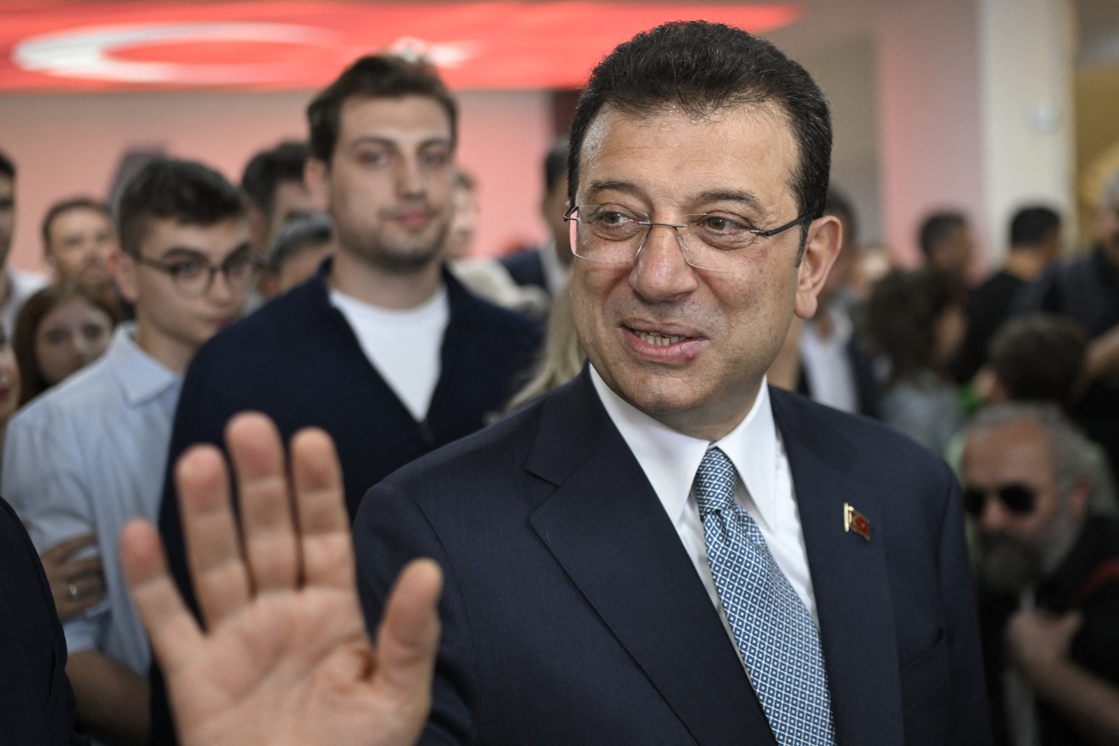 Incumbent Istanbul's mayor and mayoral candidate Ekrem Imamoglu (C) arrives at the polling station to vote for the municipal elections, in Istanbul on March 31, 2024. Turkish citizens head to the polls on March 31, 2024, in local elections as the President sets his sights on winning back Istanbul, the country's economic powerhouse, after he was re-elected head of state in a tight contest last year. The latest elections come in the throes of an economic crisis that saw the inflation rate surge to 67.1 percent and the Turkish currency crumble against dollar.,Image: 861376965, License: Rights-managed, Restrictions: , Model Release: no, Credit line: YASIN AKGUL / AFP / Profimedia