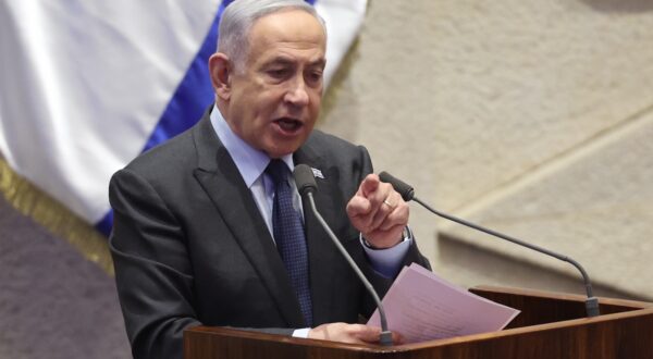 epaselect epa11166727 Israeli Prime Minister Benjamin Netanyahu speaks during the voting session for the impeachment of Hadash-Taâ€™al party MP Ofer Cassif in Jerusalem, 19 February 2024. The motion was brought up after Cassif publicly supported South Africaâ€™s genocide case against Israel at the International Court of Justice (ICJ).  EPA/ABIR SULTAN