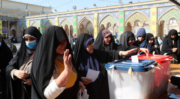 epa11190302 Veiled Iranian women cast their votes during the Iranian legislative election at the Abdol-Azim shrine in Shahre-Ray, southern Tehran, Iran, 01 March 2024. Iranians vote for new members of Iran's parliament, and for the Assembly of Experts, the body in charge of appointing Iran's Supreme Leader.  EPA/ABEDIN TAHERKENAREH