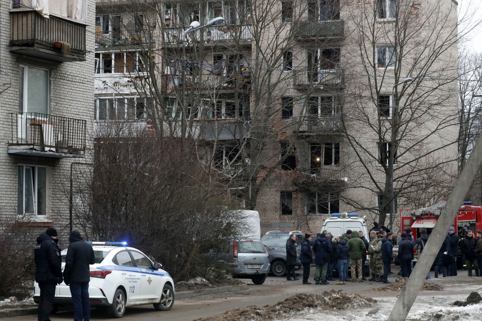 epa11192781 Russian emergency servicemen and investigators work near a damaged multi-storey residential building following an alleged drone attack in Saint Petersburg, Russia, 02 March 2024. Governor of Saint Petersburg, Alexander Beglov, wrote on his telegram channel that 'The emergency occurred in the Krasnogvardeisky district of St. Petersburg. As a result of the incident, residents of the affected apartments were evacuated'.  EPA/ANATOLY MALTSEV