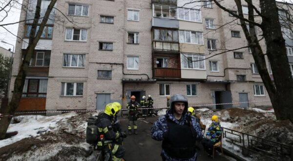 epaselect epa11192773 Russian emergency servicemen and investigators work near a damaged multi-storey residential building following an alleged drone attack in Saint Petersburg, Russia, 02 March 2024. Governor of Saint Petersburg, Alexander Beglov, wrote on his telegram channel that 'The emergency occurred in the Krasnogvardeisky district of St. Petersburg. As a result of the incident, residents of the affected apartments were evacuated'.  EPA/ANATOLY MALTSEV