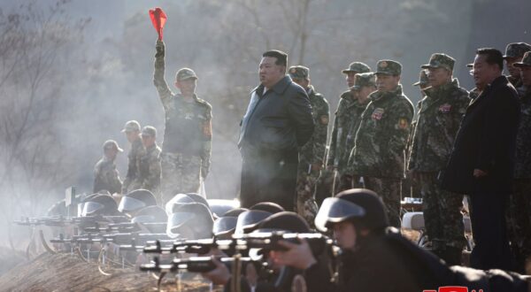 epa11203158 A photo released by the official North Korean Central News Agency (KCNA) shows North Korean leader Kim Jong Un (C) visiting a major operational training base in the western area of the Korean People's Army (KPA) at an unknown location in North Korea, 06 March 2024 (issued 07 March 2024). According to KCNA, North Korean leader Kim Jong Un stressed the need to strengthen the combat capability of the KPA and intensifying practical actual-war drills to ensure victory in a war during the visit.  EPA/KCNA   EDITORIAL USE ONLY  EDITORIAL USE ONLY