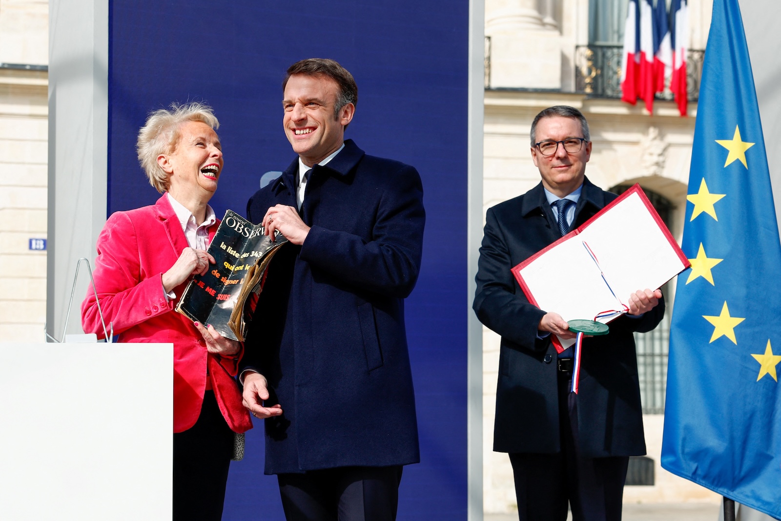 epa11206228 French President Emmanuel Macron and writer Claudine Monteil attend a ceremony to seal the right to abortion in the French constitution, on International Women's Day, at the Place Vendome, in Paris, France, 08 March 2024. French lawmakers on 04 March approved a bill to enshrine abortion rights in the Constitution becoming the only country in the world to clearly protect the right to terminate a pregnancy in its basic law.  EPA/Gonzalo Fuentes / POOL  MAXPPP OUT