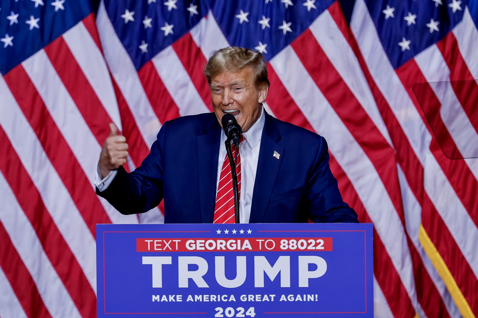 epa11210246 Former US President and Republican presidential candidate Donald Trump speaks during a 'Get Out The Vote Rally' campaign event at the Forum River Center in Rome, Georgia, USA, 09 March 2024. The Georgia presidential primary election is 12 March 2024.  EPA/ERIK S. LESSER