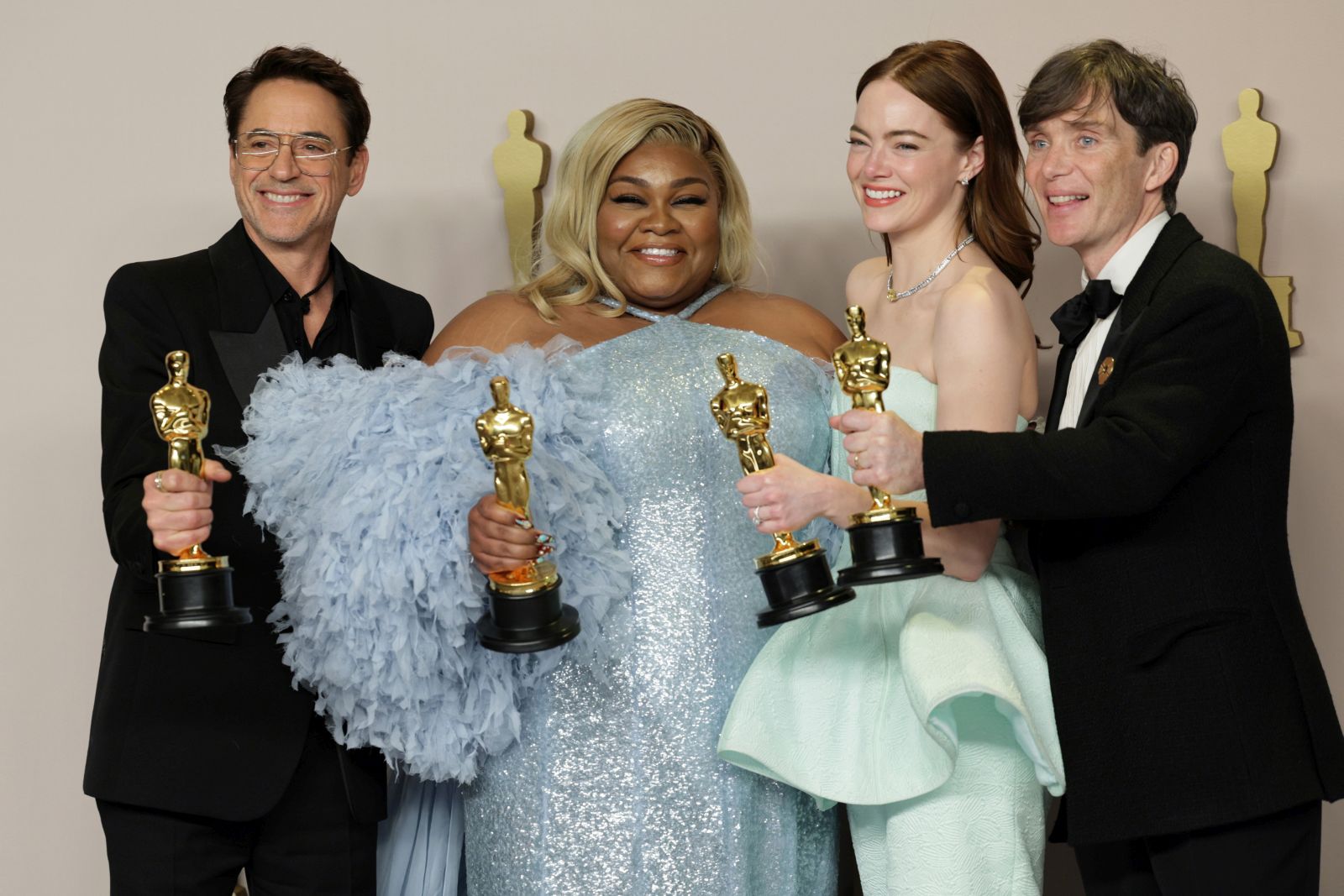 epa11213478 (L-R) Robert Downey Jr., Best Supporting Actor winner; Da'Vine Joy Randolph, Best Supporting Actress winner; Emma Stone, Best Actress winner; and Cillian Murphy, Best Actor winner, hold up their Oscars in the press room during the 96th annual Academy Awards ceremony at the Dolby Theatre in the Hollywood neighborhood of Los Angeles, California, USA, 10 March 2024. The Oscars are presented for outstanding individual or collective efforts in filmmaking in 23 categories.  EPA/ALLISON DINNER