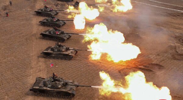 epa11219538 A photo released by the official North Korean Central News Agency (KCNA) shows tanks firing during a training competition involving tank units of the Korean People's Army (KPA), at an undisclosed location in North Korea, 13 March 2024 (issued 14 March 2024). North Korean Supreme leader Kim Jong Un joined troops in military training to operate new developed battle tanks, KCNA reported on 14 March.  EPA/KCNA   EDITORIAL USE ONLY  EDITORIAL USE ONLY