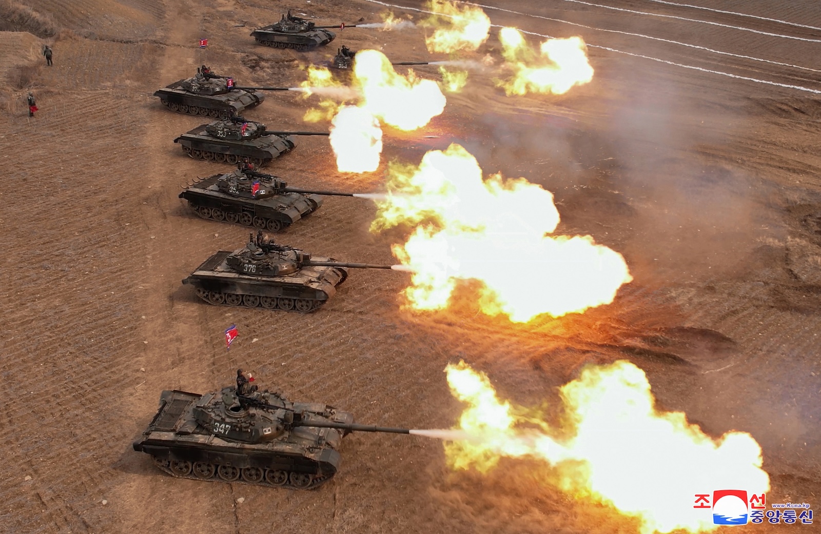 epa11219538 A photo released by the official North Korean Central News Agency (KCNA) shows tanks firing during a training competition involving tank units of the Korean People's Army (KPA), at an undisclosed location in North Korea, 13 March 2024 (issued 14 March 2024). North Korean Supreme leader Kim Jong Un joined troops in military training to operate new developed battle tanks, KCNA reported on 14 March.  EPA/KCNA   EDITORIAL USE ONLY  EDITORIAL USE ONLY