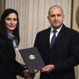 epa11227693 Bulgaria's Foreign Affairs Minister and GERB party's candidate for prime minister Mariya Gabriel (L) receives a mandate to form a new government from Bulgarian President Rumen Radev in Sofia, Bulgaria, 18 March 2024.  EPA/VASSIL DONEV