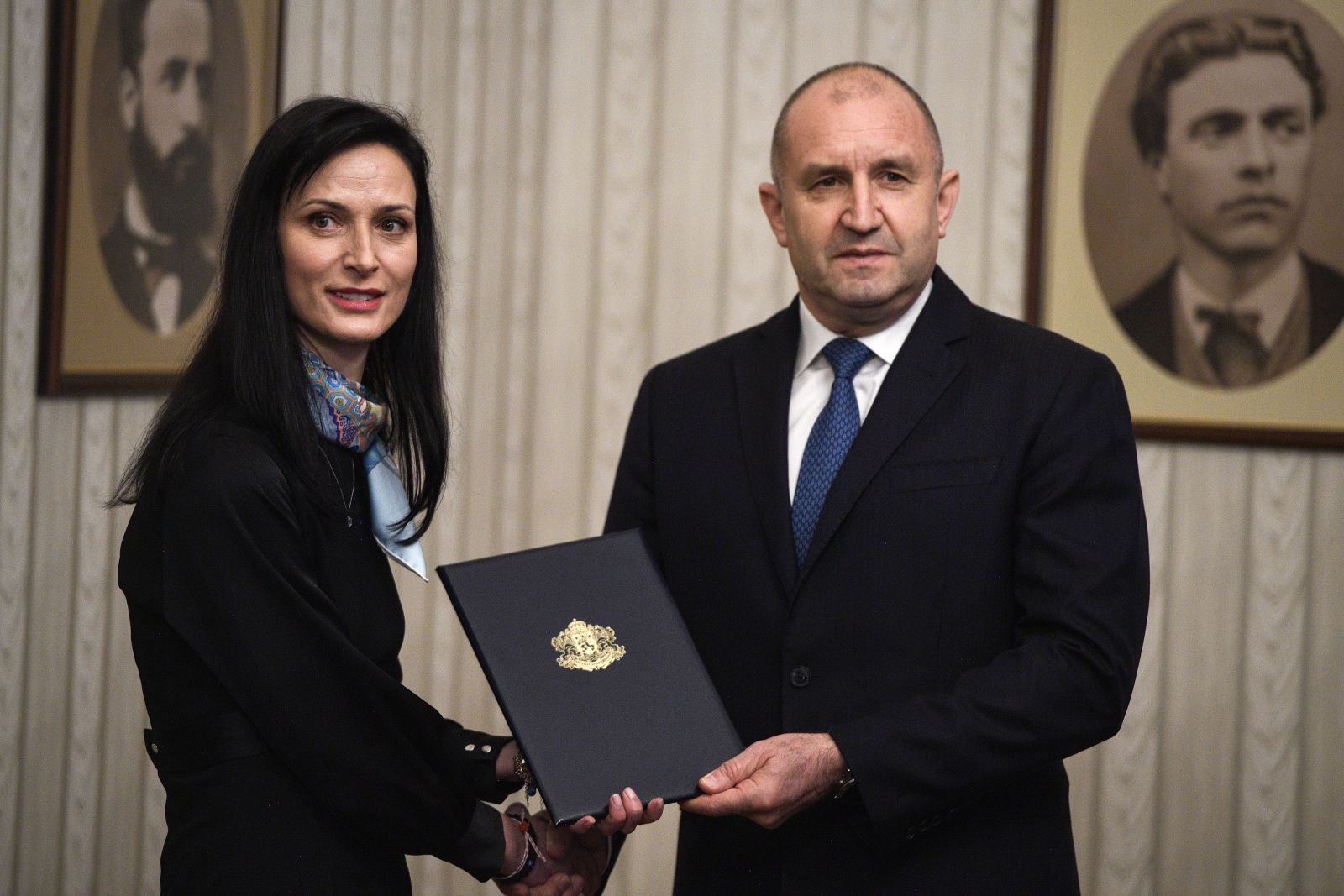 epa11227693 Bulgaria's Foreign Affairs Minister and GERB party's candidate for prime minister Mariya Gabriel (L) receives a mandate to form a new government from Bulgarian President Rumen Radev in Sofia, Bulgaria, 18 March 2024.  EPA/VASSIL DONEV