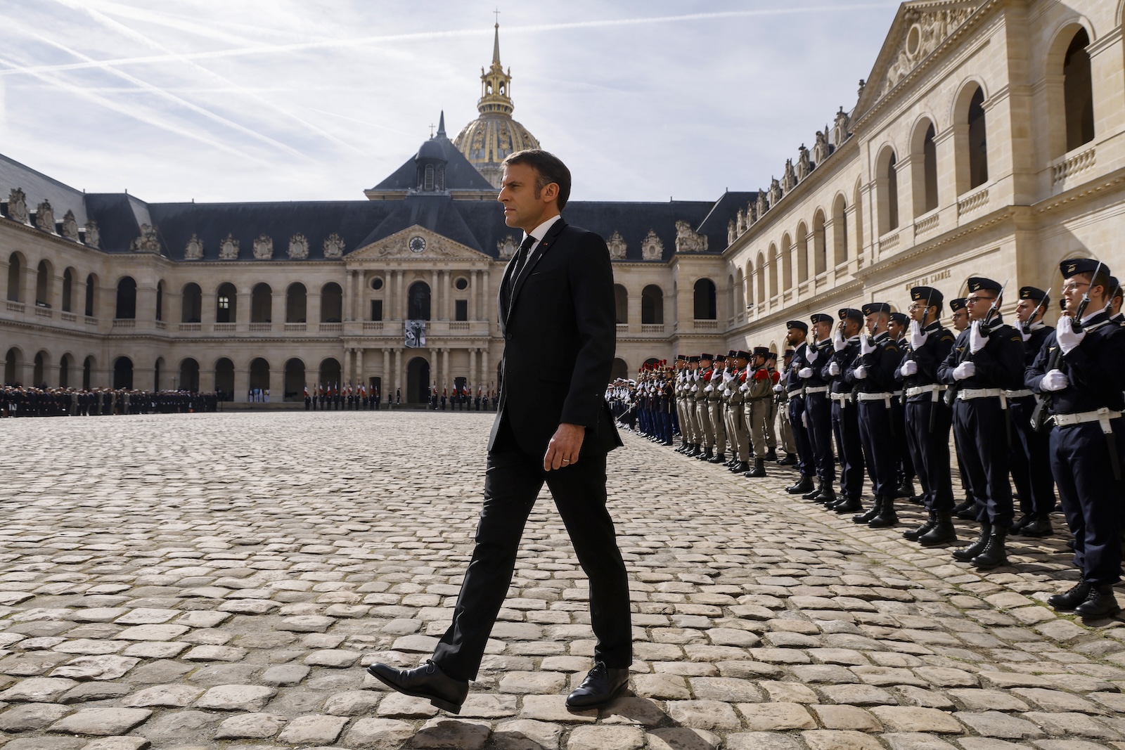 epa11231052 France's President Emmanuel Macron walks as he takes part in a 'national tribute' ceremony to late French politician and admiral, Philippe de Gaulle, the son of Charles de Gaulle, at the Hotel des Invalides in Paris, France, 20 March 2024. Admiral Philippe de Gaulle, the eldest child of General Charles de Gaulle, the first president of the French Fifth Republic, died on 13 March in Paris at the age of 102.  EPA/LUDOVIC MARIN / POOL  MAXPPP OUT