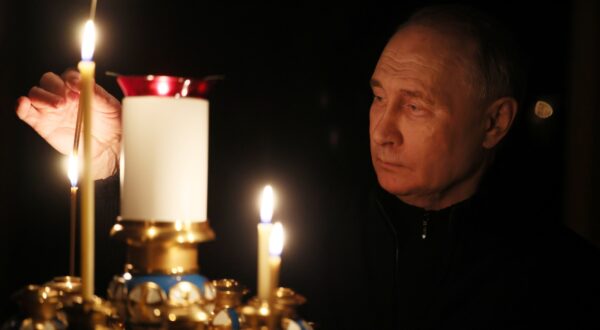 epa11241340 Russian President Vladimir Putin lights a candle to commemorate the victims of a terrorist attack on the Crocus City Hall concert venue on a day of national mourning in Moscow, Russia, 24 March 2024. On 24 March, Russia observed a day of national mourning for the victims of the terrorist attack in Krasnogorsk's Crocus City Hall. At least 152 people were killed and more than 100 hospitalized after a group of gunmen attacked the concert hall in the Moscow region on 22 March evening, according to Russian authorities. Eleven suspects, including all four gunmen directly involved in the terrorist attack, have been detained, Russian officials said.  EPA/MIKHAIL METZEL/SPUTNIK/KREMLIN POOL