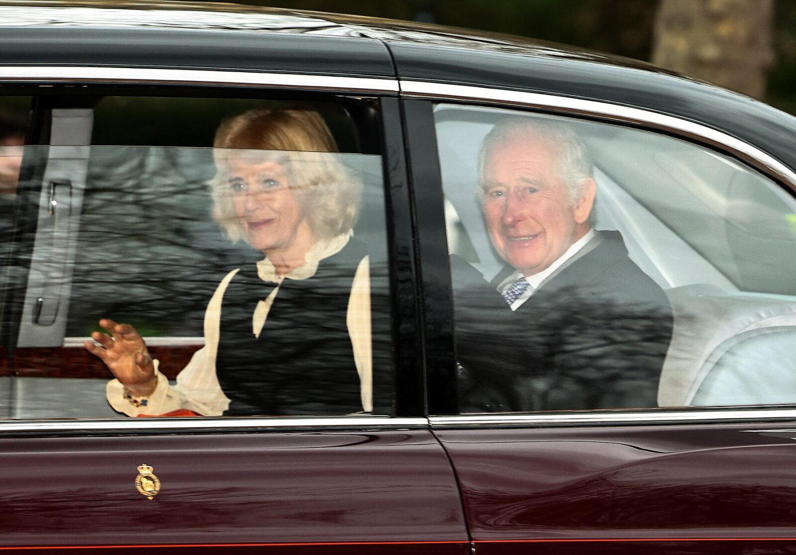 Britain's King Charles III and Britain's Queen Camilla wave as they leave by car from Clarence House in London on February 6, 2024. King Charles III's estranged son Prince Harry reportedly arrived in London on Tuesday after his father's diagnosis of cancer, which doctors "caught early".,Image: 844016228, License: Rights-managed, Restrictions: , Model Release: no, Credit line: HENRY NICHOLLS / AFP / Profimedia