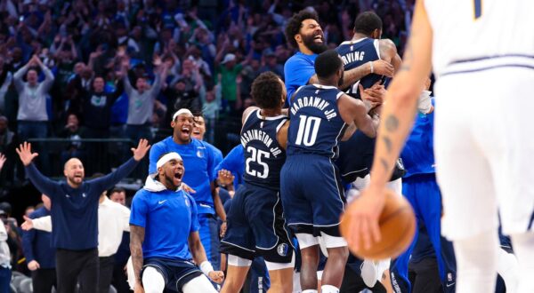 Mar 17, 2024; Dallas, Texas, USA;  Dallas Mavericks guard Kyrie Irving (11) celebrates with teammates after the win against the Denver Nuggets at American Airlines Center. Mandatory Credit: Kevin Jairaj-USA TODAY Sports Photo: Kevin Jairaj/REUTERS