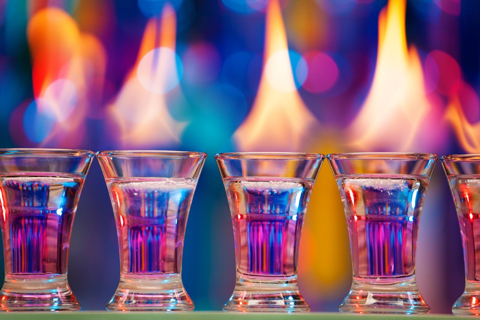 Close-up picture of hot shot glasses standing in a row on a bar counter,Image: 318252558, License: Royalty-free, Restrictions: , Model Release: no, Credit line: Sergey Novikov / Alamy / Alamy / Profimedia