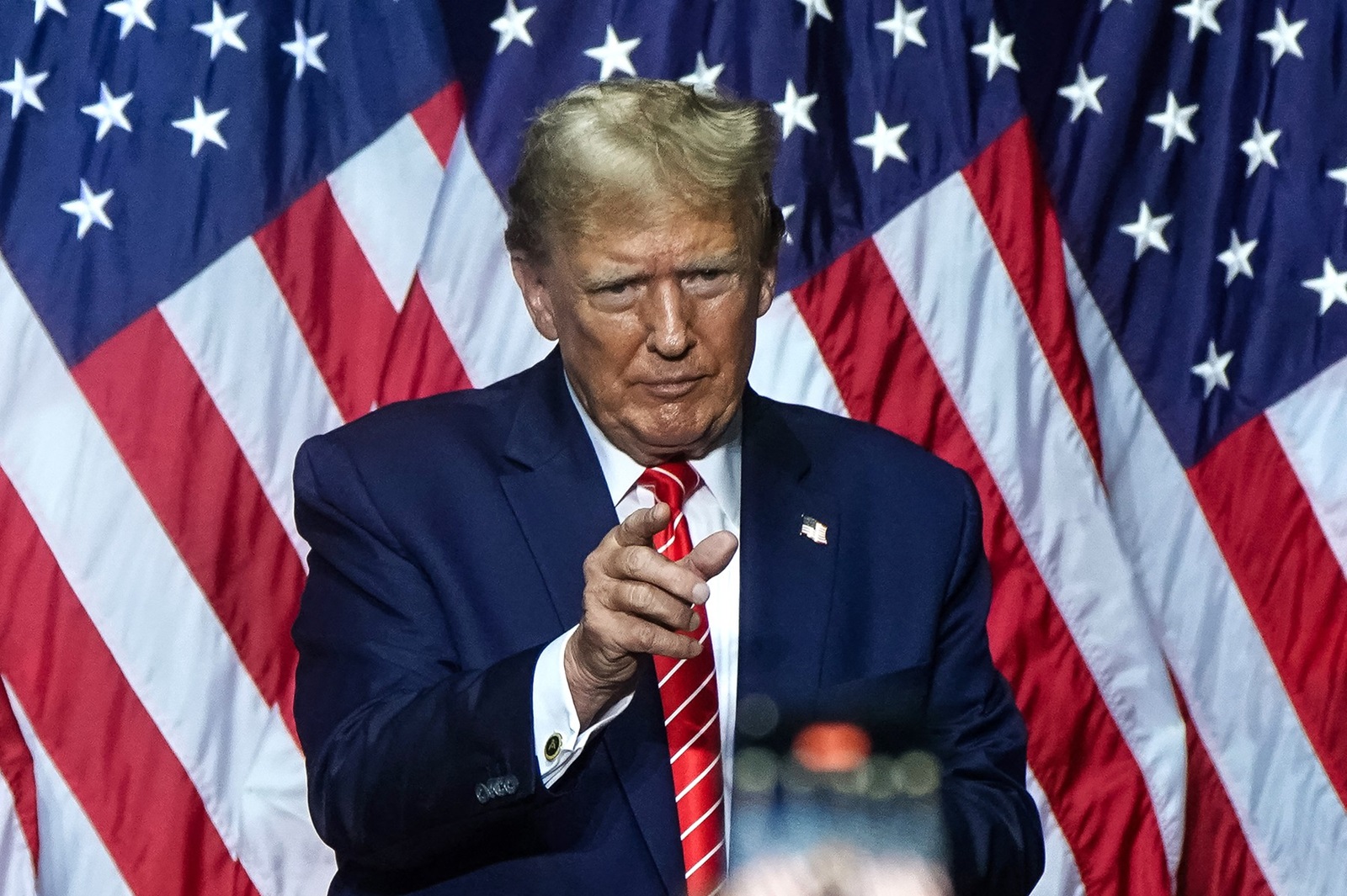Former US President and 2024 presidential hopeful Donald Trump gestures to the crowd  after speaking at a campaign event in Rome, Georgia, on March 9, 2024.,Image: 855381858, License: Rights-managed, Restrictions: , Model Release: no, Credit line: Elijah Nouvelage / AFP / Profimedia