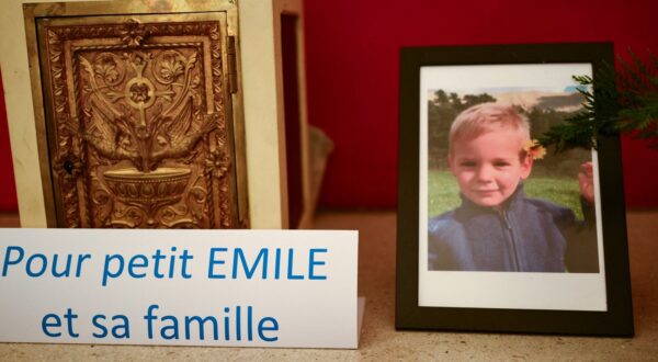 This photograph taken on March 21, 2024, inside a chapel in La Bouilladisse southern France, shows a card with the inscription reading "For the little Emile and his family" next to a portrait of Emile, a missing boy, who disappeared on July 8, 2023 in Le Vernet, southeastern France.,Image: 858528007, License: Rights-managed, Restrictions: , Model Release: no, Credit line: CHRISTOPHE SIMON / AFP / Profimedia